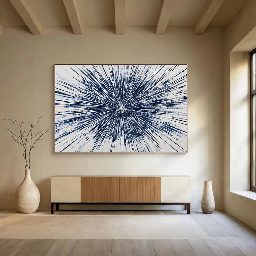Large abstract painting featuring a blue starburst design with intricate radiating lines, creating a vibrant and energetic composition on a white background.SC430