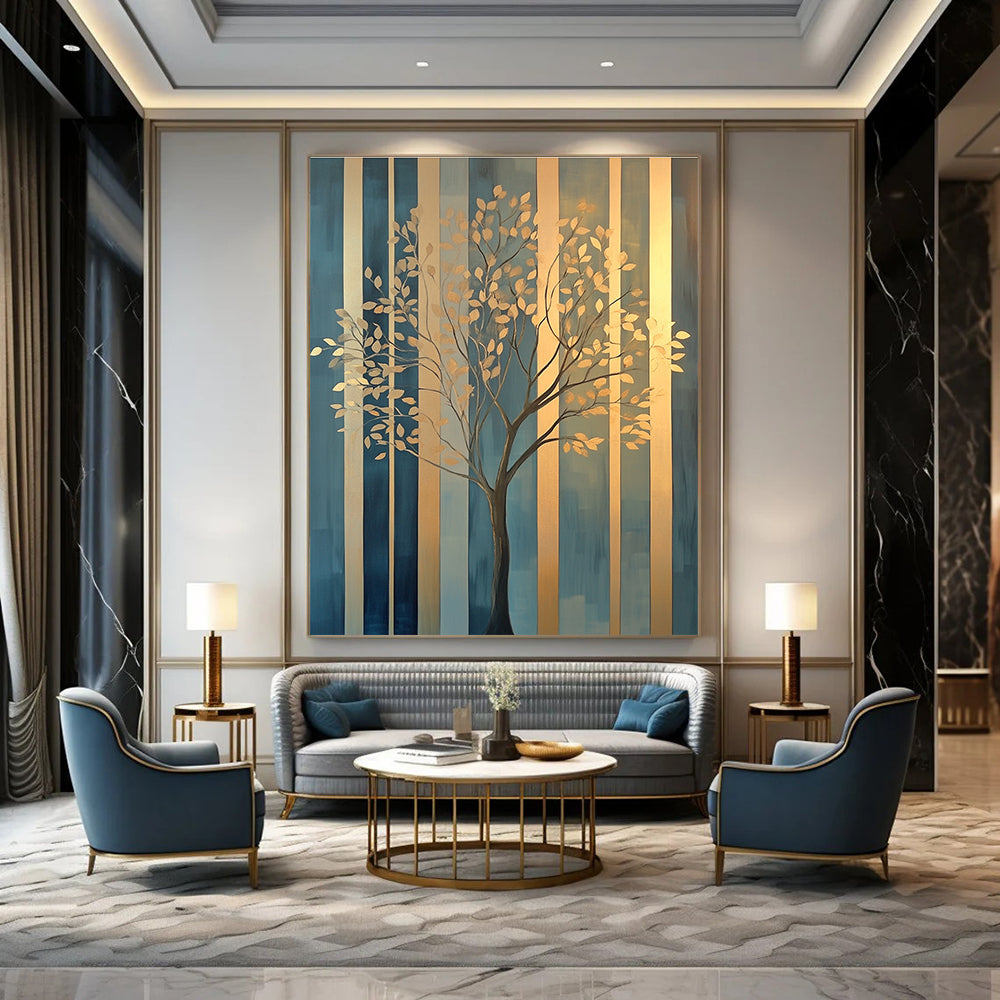 Large abstract painting featuring elegant gold tree branches against geometric blue green patterns with soft edges and a warm glow on canvas.STSC1117