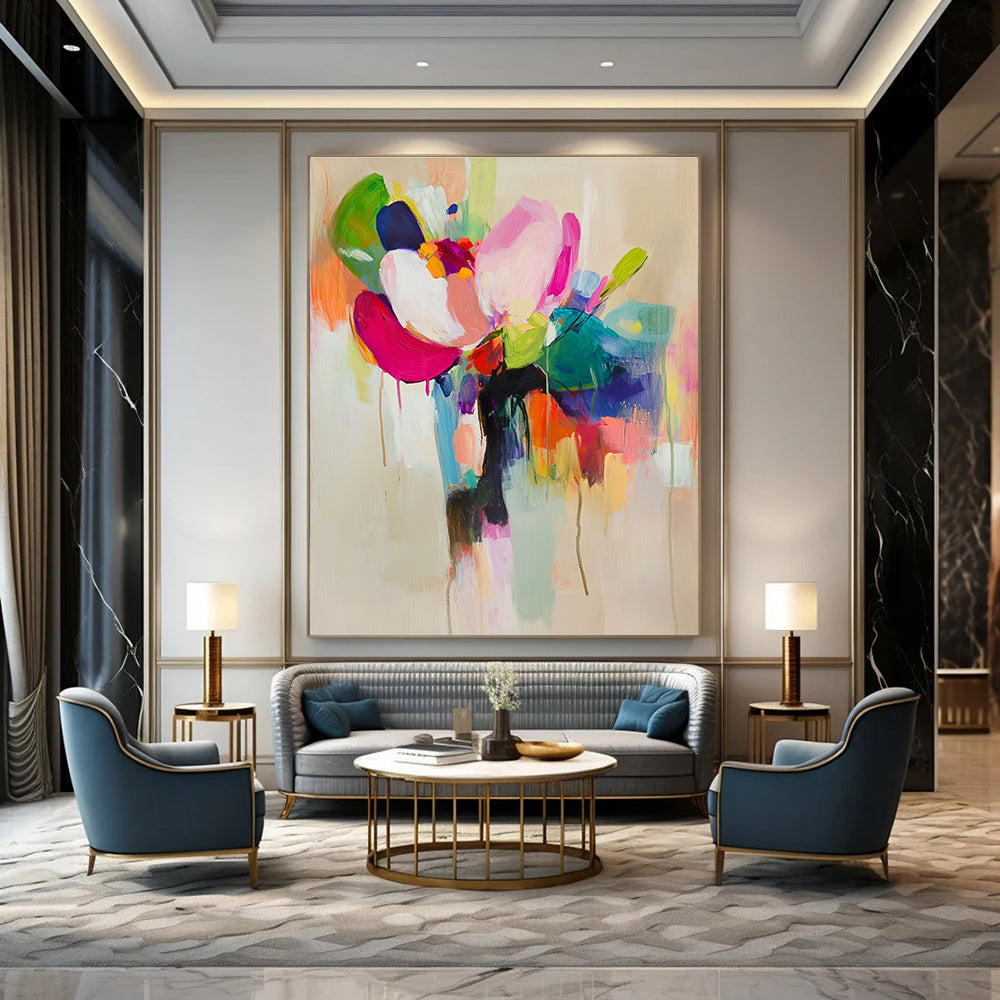 Large abstract painting featuring vibrant colors and soft brushstrokes with a flower in a vase on a light beige background.STSC822