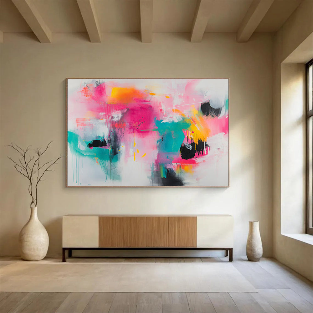 Large abstract painting featuring vibrant splashes of pink teal and yellow on a white background with loose brushstrokes and chaotic shapes.SC387