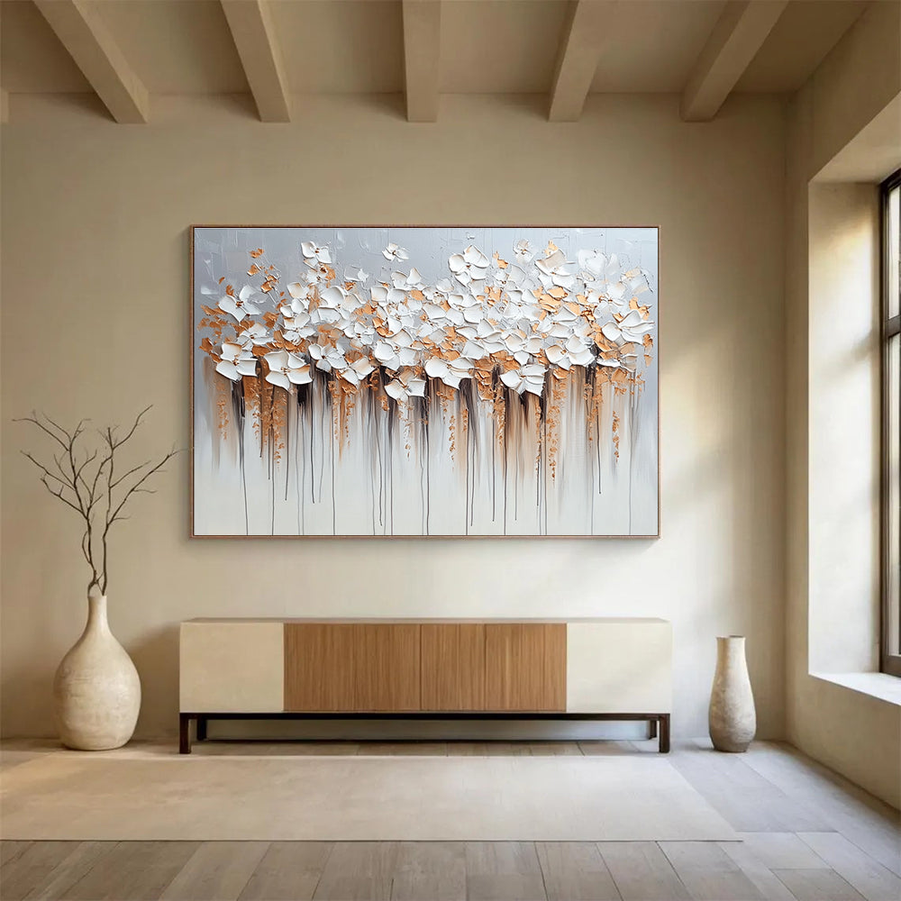Large abstract painting with flowers in light gray and beige featuring dripped paint technique heavy impasto texture in silver and gold hues.SC294