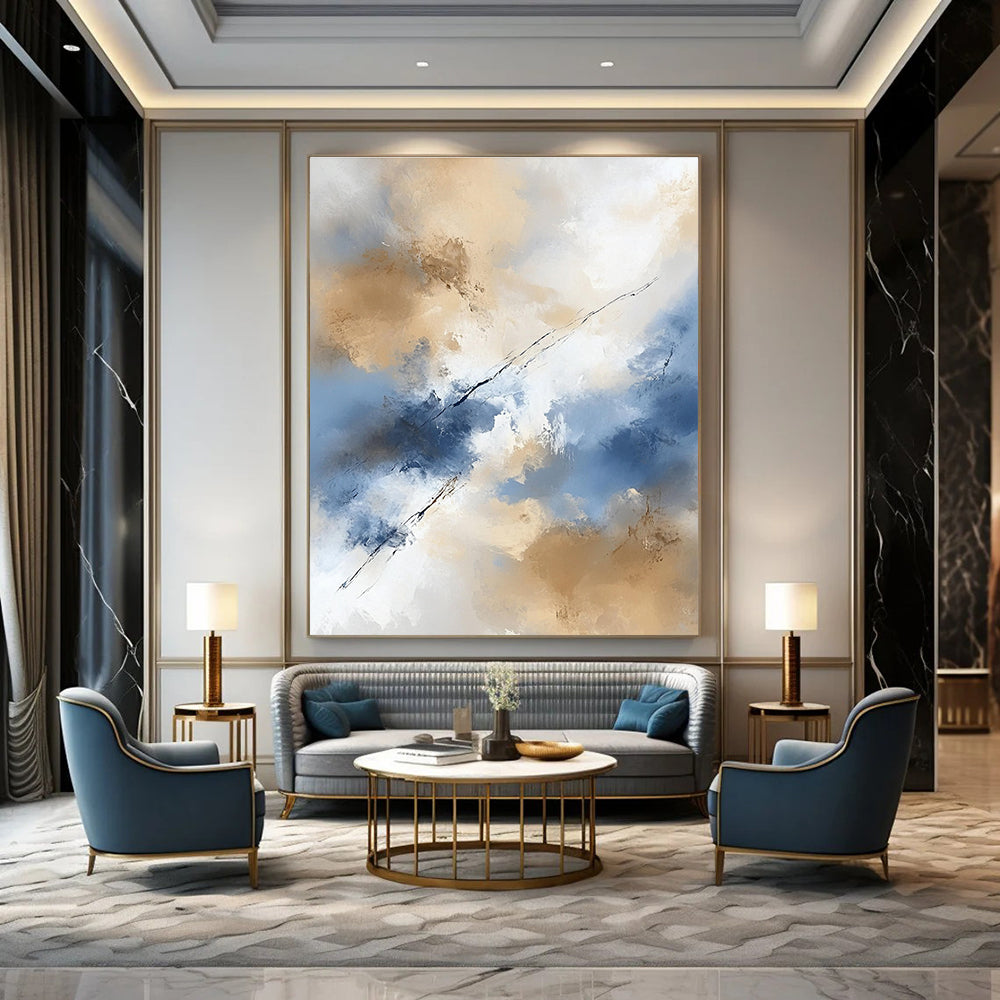 Large abstract painting in beige and blue tones features white clouds creating an ethereal ambiance with delicate brushstrokes and flowing lines.STSC409
