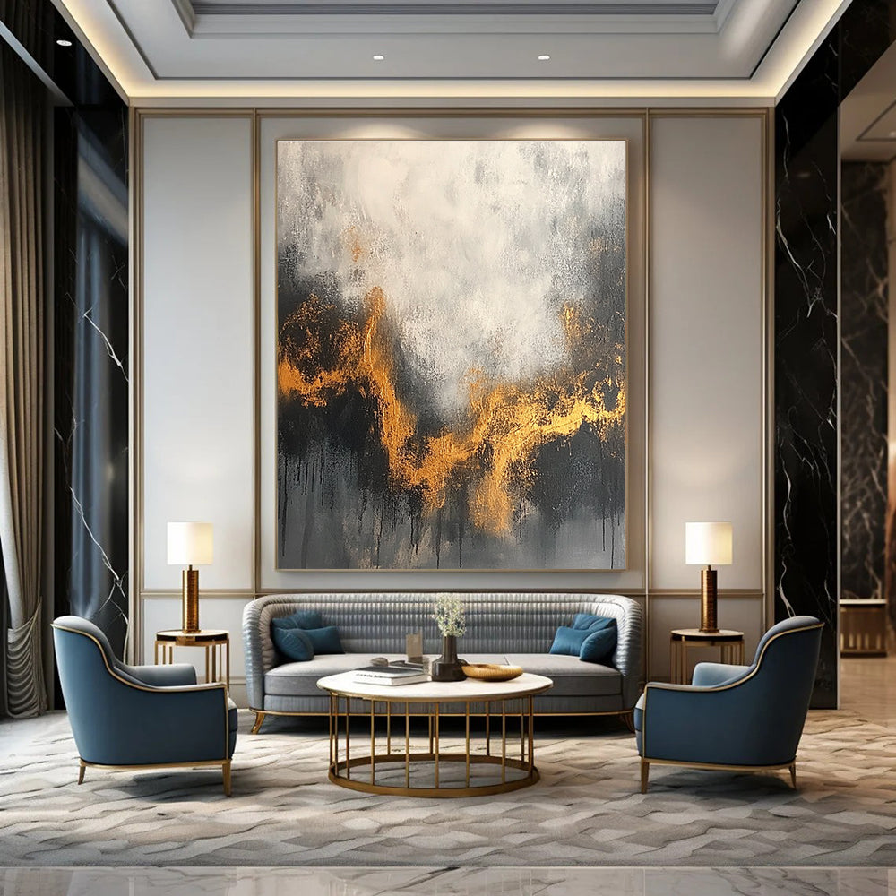 Large abstract painting with a gray and white background accentuated by gold tones and dark colors for an atmospheric effect.STSC394