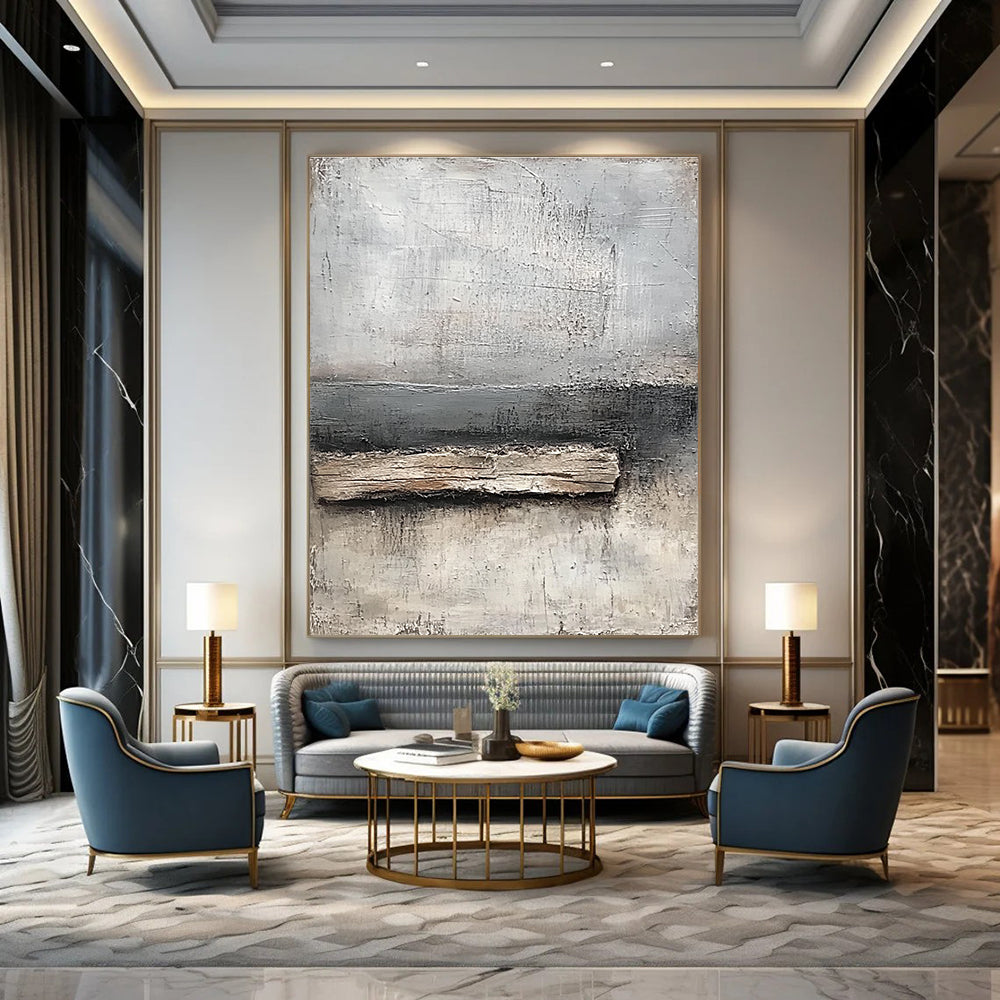 Abstract painting featuring neutral tones of gray and white with textured canvas and thick paint highlighting a small piece of old wood by the water's edge.STSC138