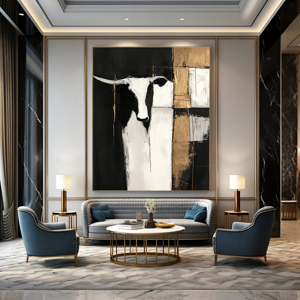 Large abstract painting in black and white with gold accents featuring cow shapes and wood planks on a dark background with visible brush strokes.STSC223