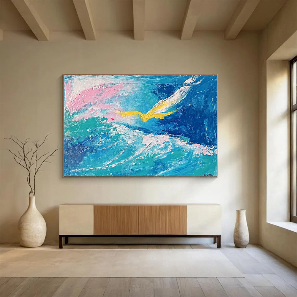 Large abstract painting featuring fluid turquoise and blue tones with pink highlights, a yellow bird, and a whimsical smile hidden within the waves.SC364