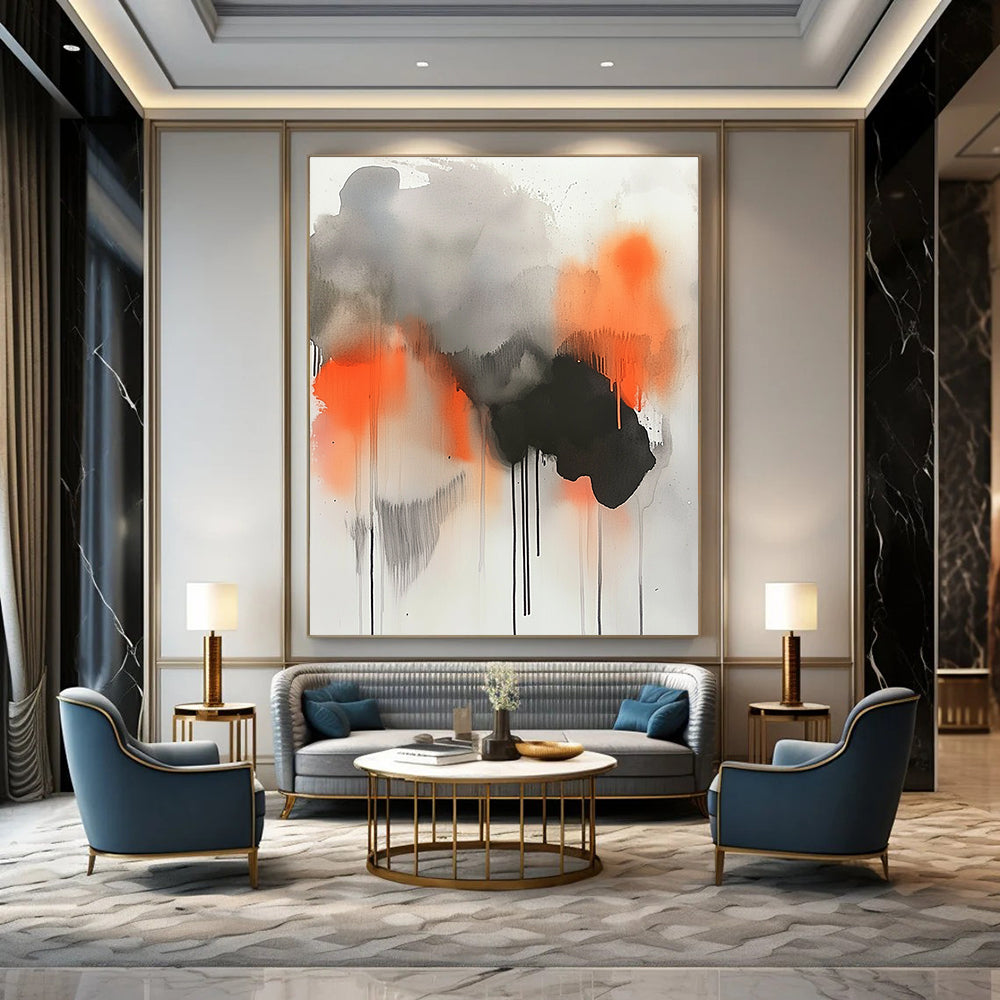 Large abstract painting featuring gray orange and black paint drips with watercolor clouds and smoke elements for a striking visual impact.STSC758