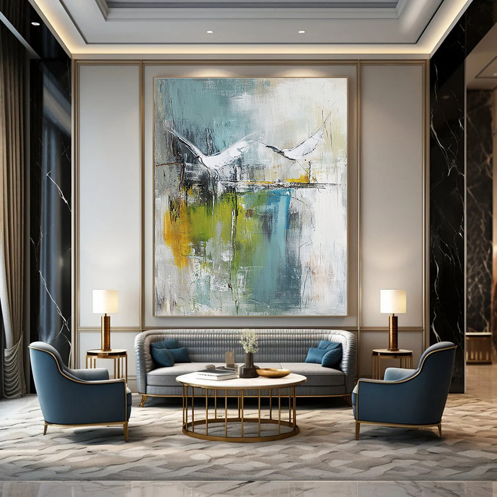 Large abstract painting of birds soaring over water in pale green and white with hints of blue beige and gray in a mixed media style.STSC303