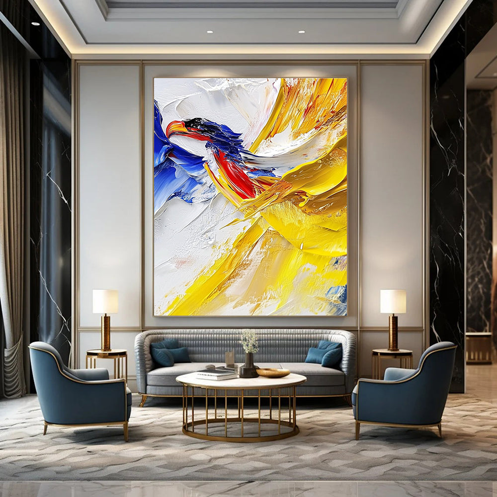 Large abstract painting with impasto technique showcasing vibrant yellow and blue hues featuring a detailed vulture against a white cloud background.STSC426