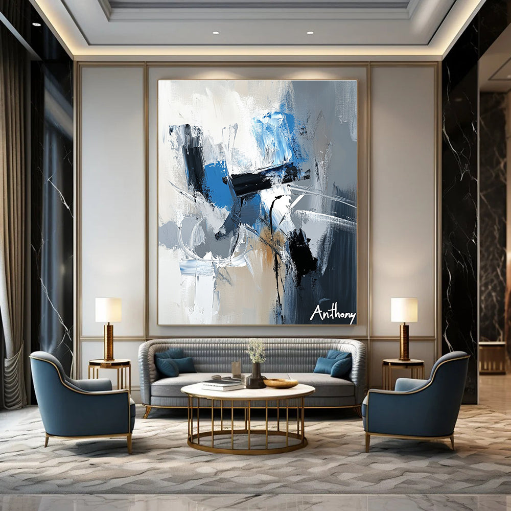 Large abstract painting featuring the name Anthony in white gray and blue tones with dynamic brush strokes and rich textures.STSC450