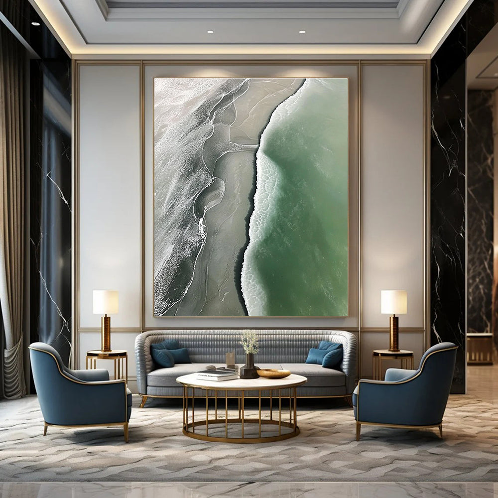 Abstract art piece featuring an aerial view of a beach with green and gray waves flowing onto white sandy shores.STSC529