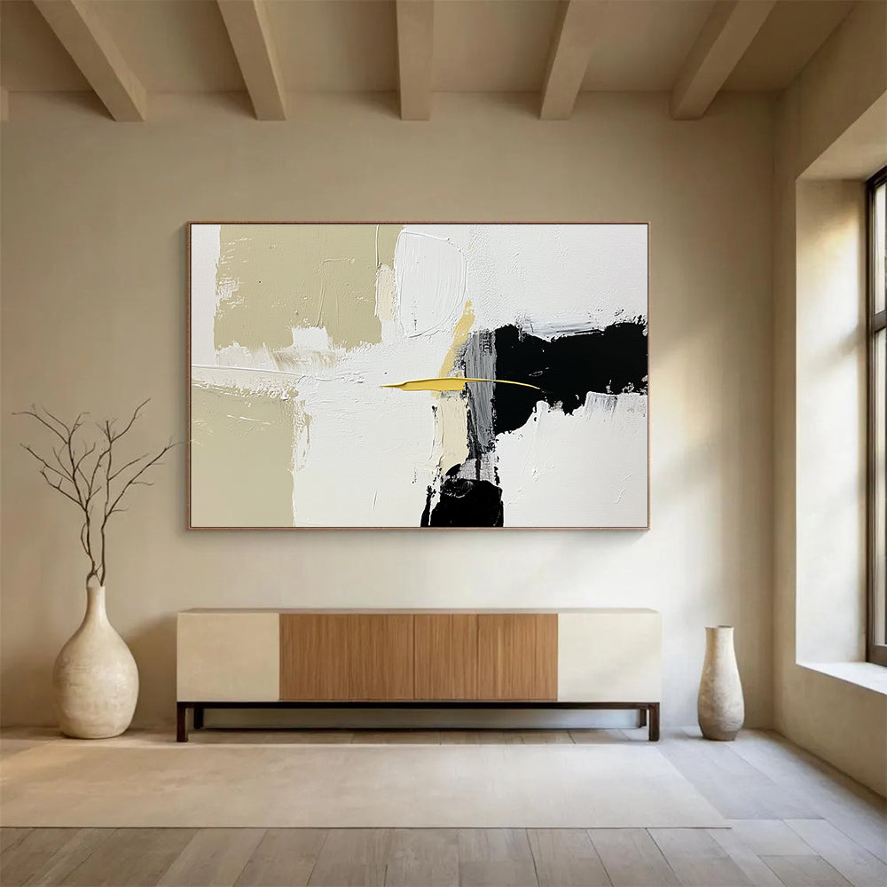 Large abstract painting featuring white beige and black shapes with brush strokes and a small yellow line on an off-white background.SC206