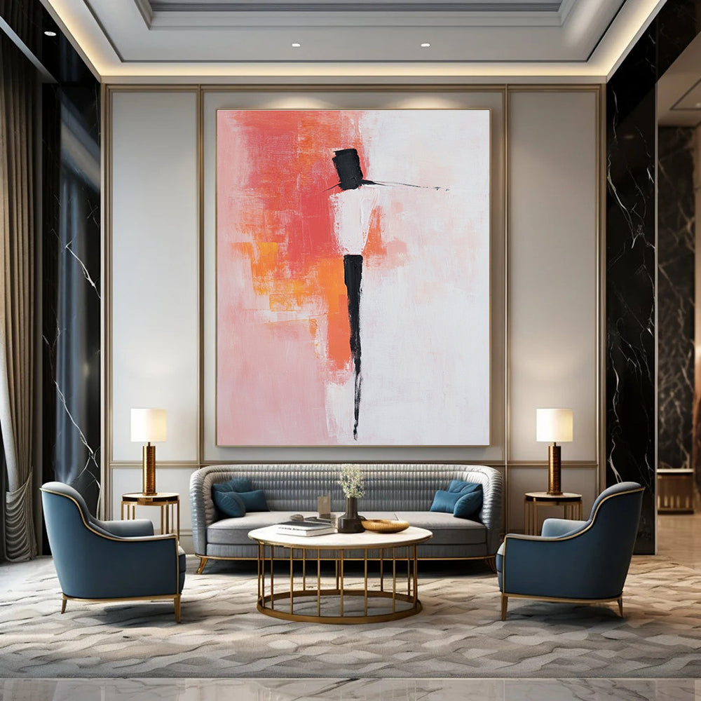Large abstract painting with pink and white background featuring bold brush strokes simple shapes and peachy red accents with black dress shoes.STSC404