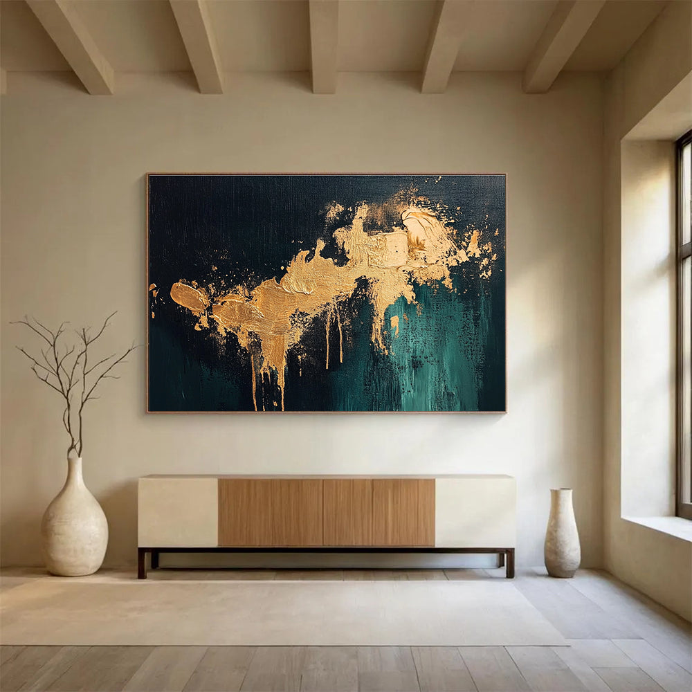 Large abstract painting with gold splashes on dark green background showcasing intricate details and a moody atmospheric feel.SC259