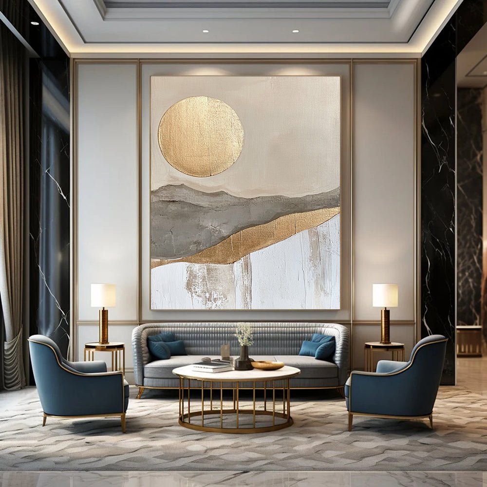 Large abstract painting featuring a golden sun and moon in a soft gray beige and white landscape with textured gold accents.STSC126