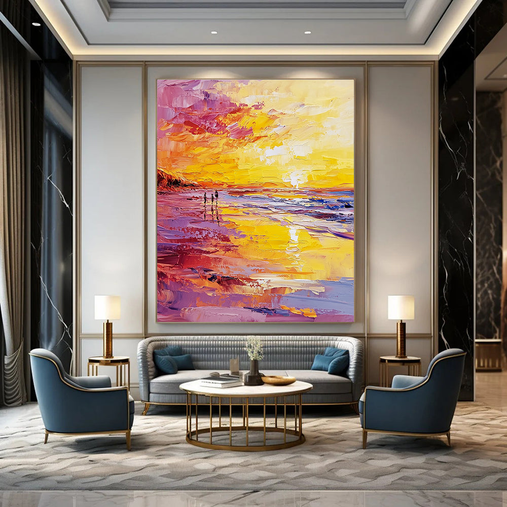 Abstract oil painting of a beach at sunset featuring a vibrant yellow and pink color scheme with small figures walking along the shore.STSC157