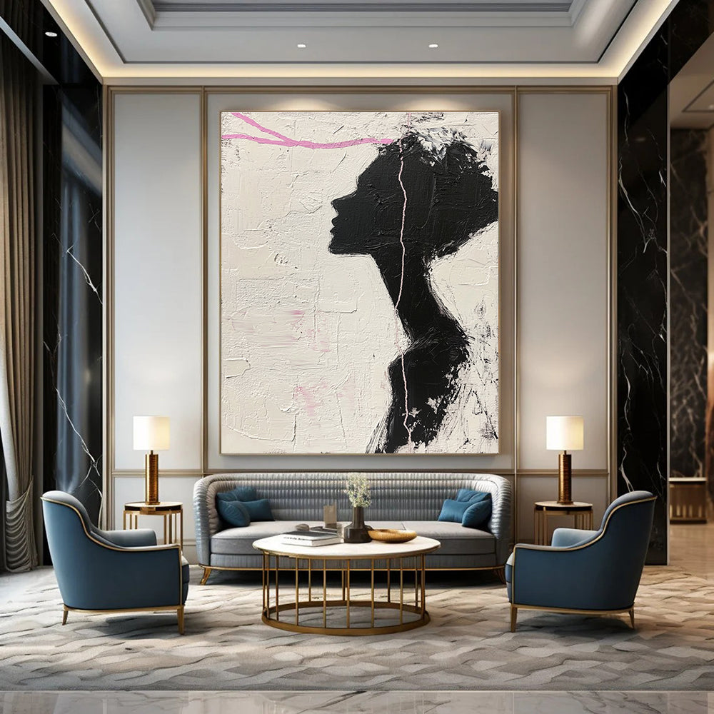 Large abstract painting in black and white featuring a woman’s silhouette with pink accents enhancing her facial features against a textured background.STSC1091