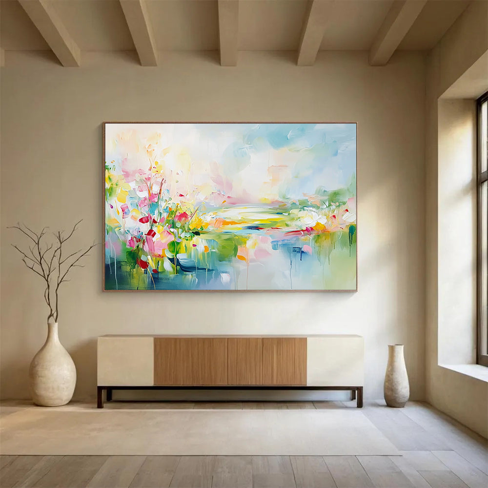 Large abstract landscape painting featuring spring flowers in a colorful meadow with a flowing river vibrant greenery and a serene sky.SC084