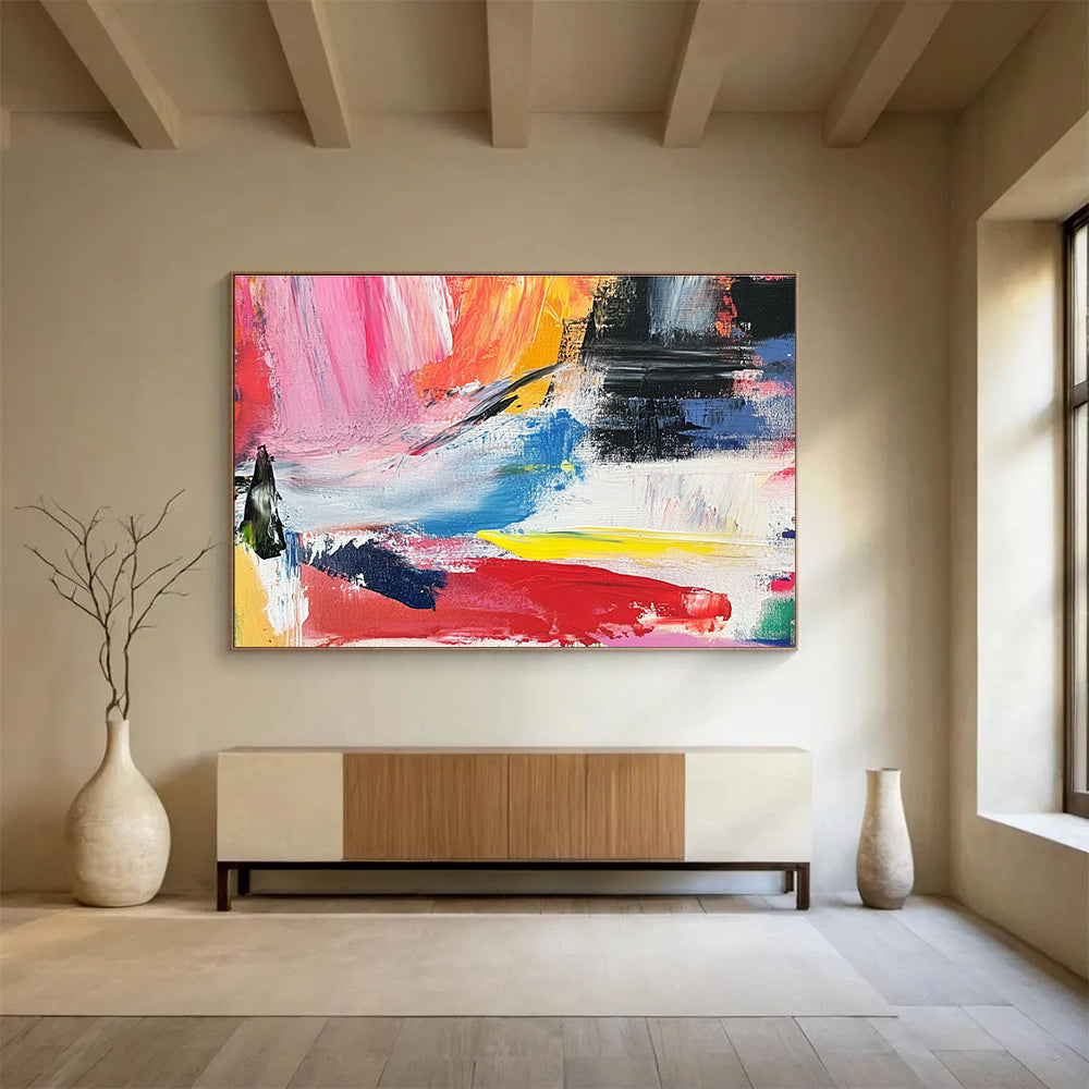 Abstract painting with vibrant colors and bold brush strokes evokes springtime joy and energy in a lively landscape of reds yellows and blues.SC437