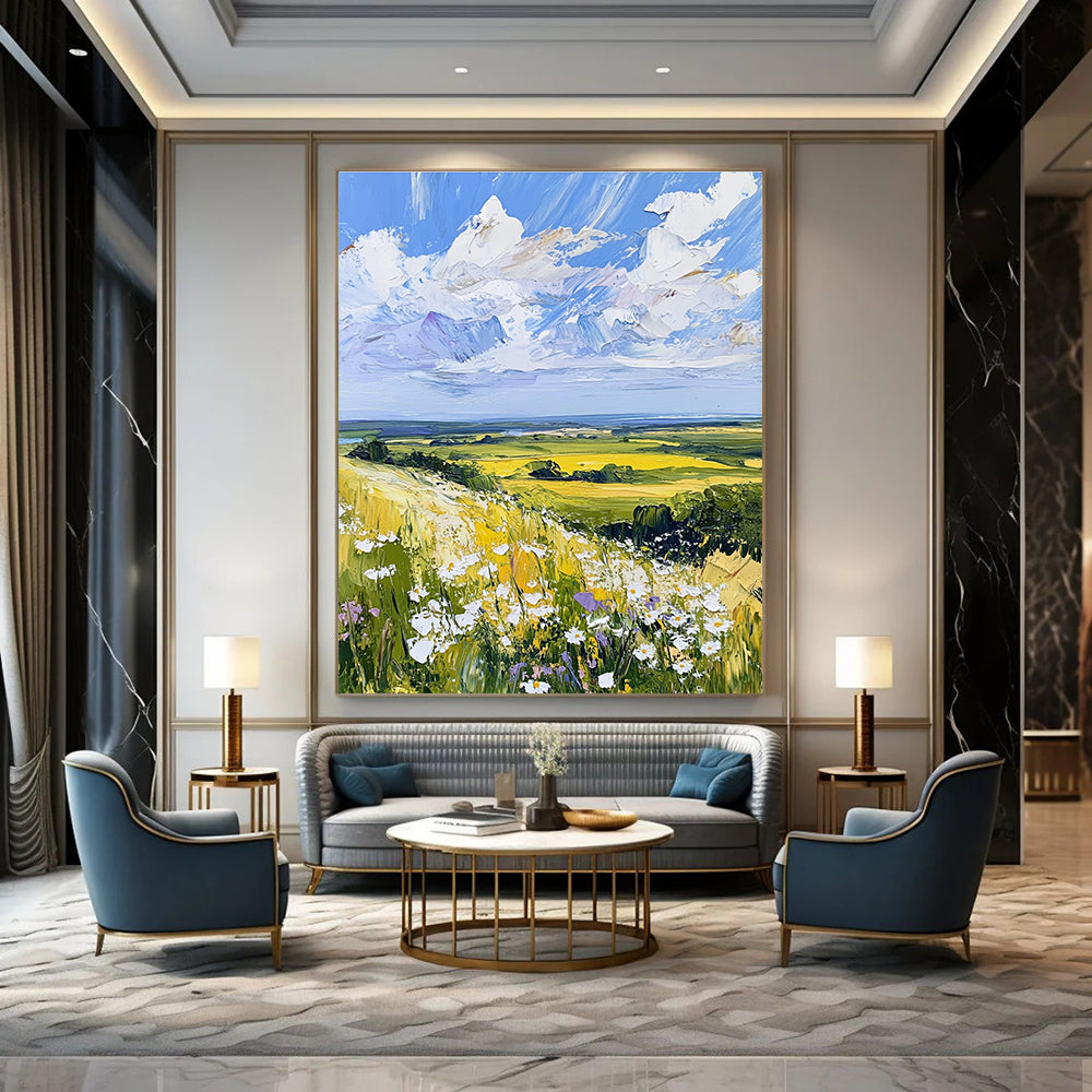 Large abstract painting of the English countryside featuring daisies under a vivid blue sky with fluffy white clouds in a whimsical style.STSC898