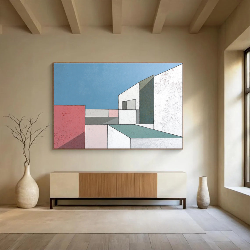 A large abstract painting featuring minimalist white buildings with large windows against a serene blue sky highlighting sharp color contrasts and geometric shapes.SC487