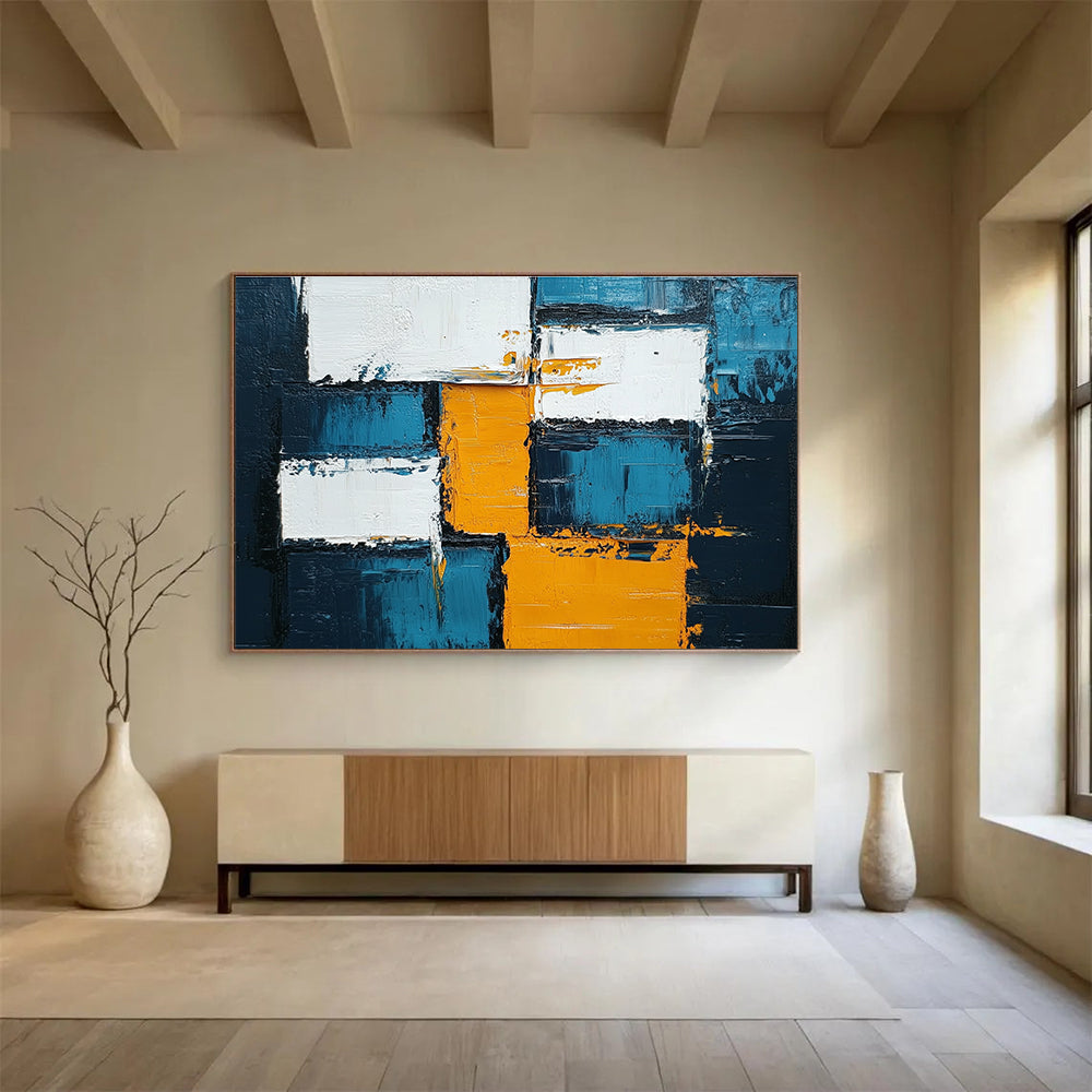 Large abstract painting featuring blue, white, and yellow squares with thick impasto texture, embodying bold expressionism for any modern space.SC122