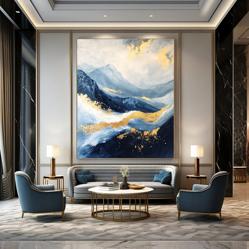 Abstract Blue and Gold Mountain Landscape Painting featuring a white sky, golden waves, dark blue clouds, and black rocks beautifully detailed.STSC030