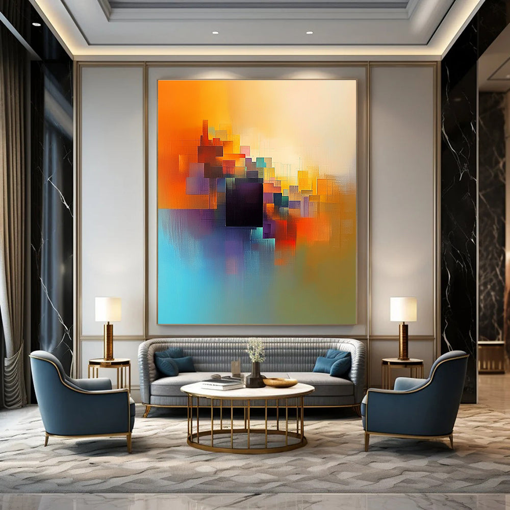 Large abstract painting featuring light orange blue and yellow colors with a serene cityscape and a central dark brown cube.STSC687