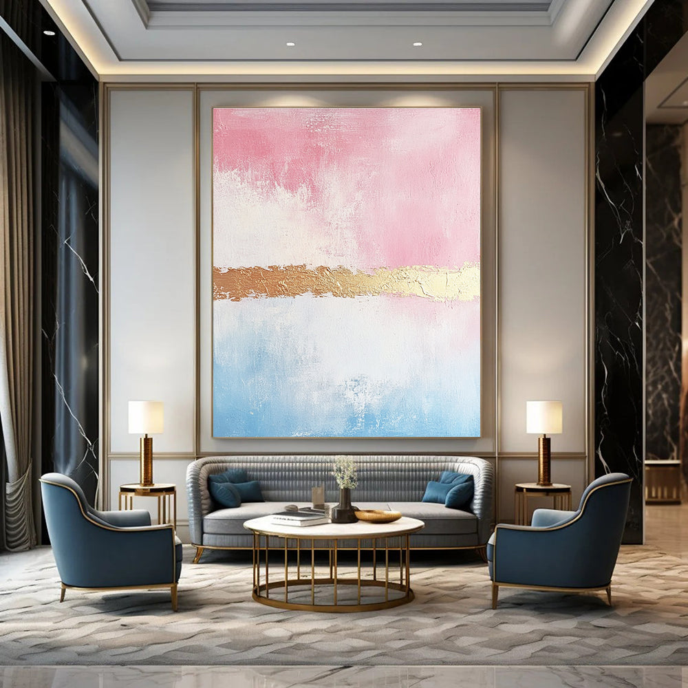 Large abstract painting with soft pink and gold tones textured brushstrokes and a delicate golden line enhancing its minimalist elegance.STSC454