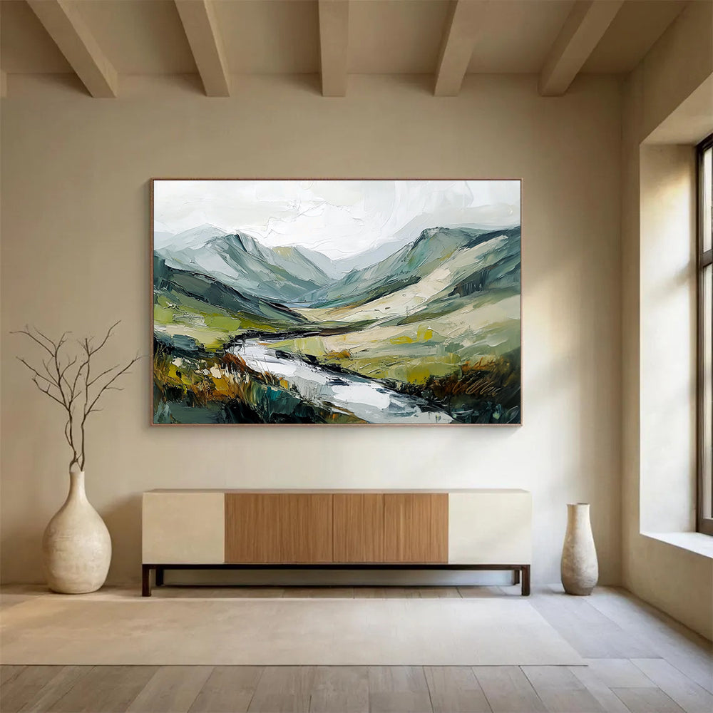 Large abstract painting of an Irish landscape with green and gray mountains flowing river and textured brush strokes against a white sky.SC596