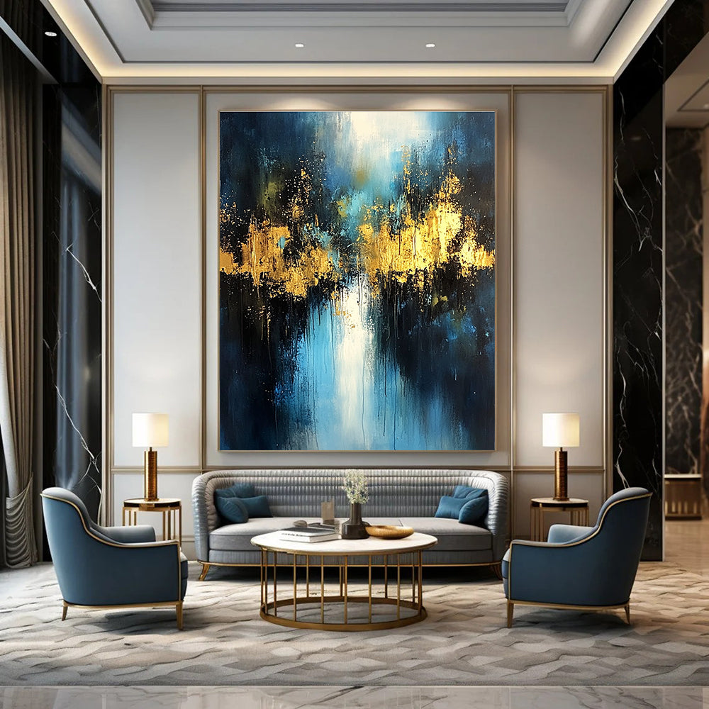 Large abstract painting with light blue and dark gold colors featuring atmospheric brushstrokes gold foil embellishments and a mysterious night scene.STSC399