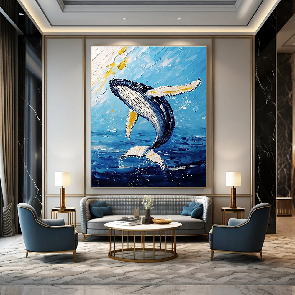 Large abstract painting featuring a majestic humpback whale mid-air with vibrant white and yellow brushstrokes against a light sky-blue and dark gold background.STSC1231