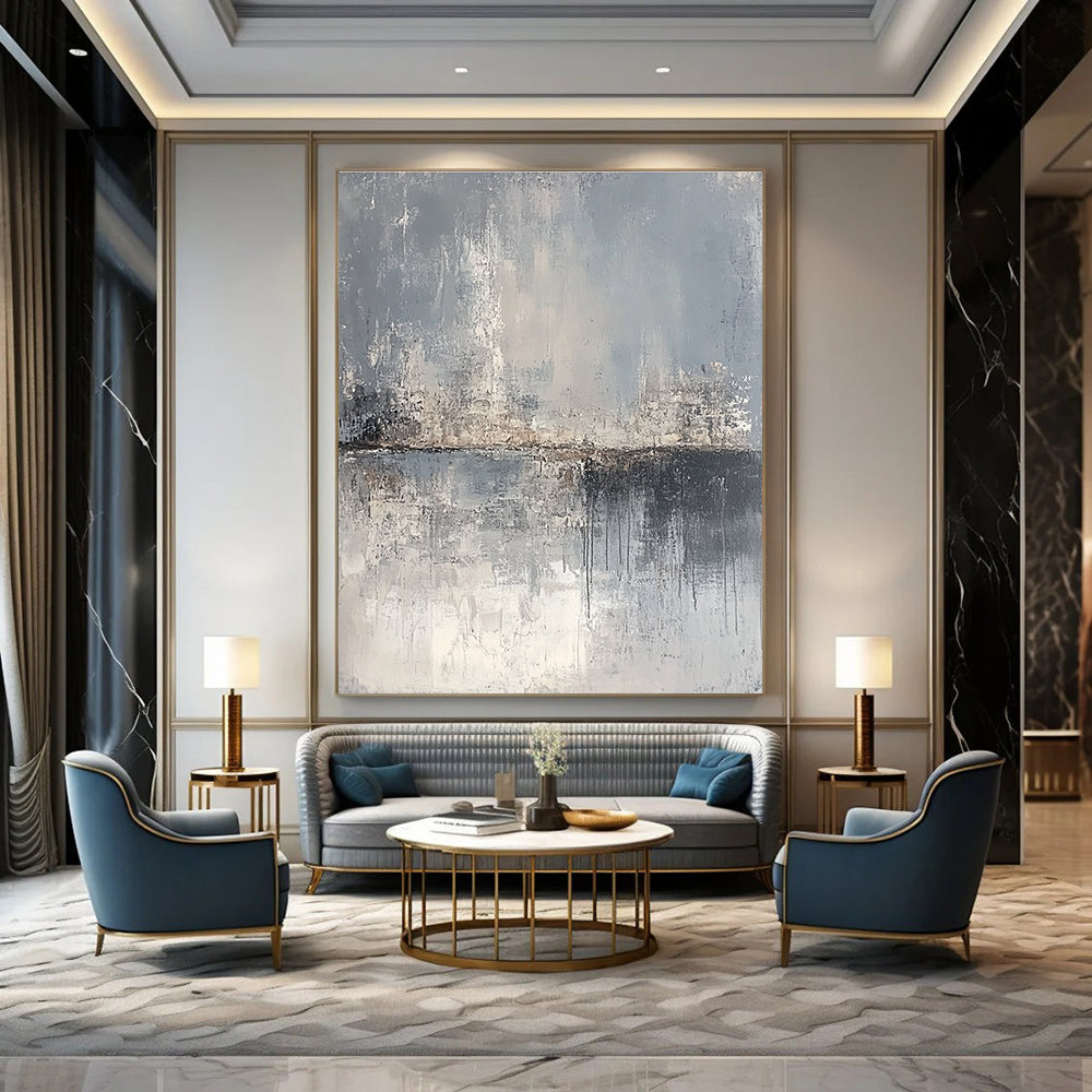 Large abstract painting depicting a serene landscape in gray and beige tones, featuring canvas texture and an atmospheric quality.STSC063