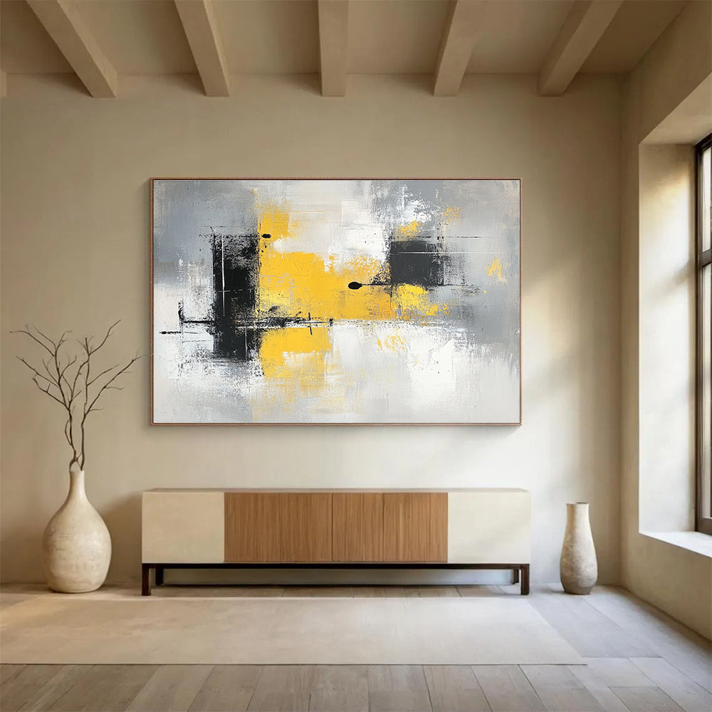 Large abstract painting with gray and yellow tones featuring blocks of color soft edges and delicate brushstrokes on a gray background.SC241