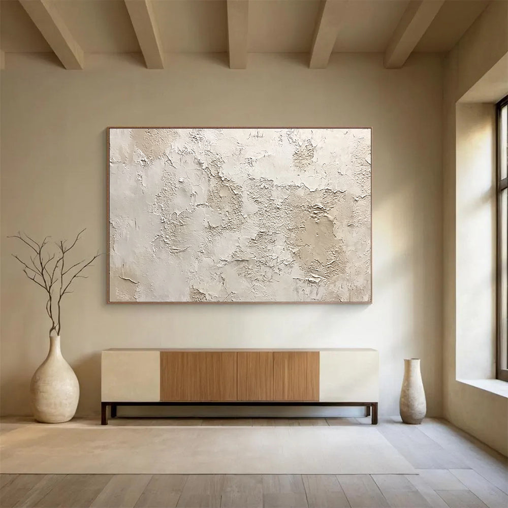Large abstract painting of a textured white wall with shades of gray beige and brown showing organic shapes and a weathered appearance.SC183