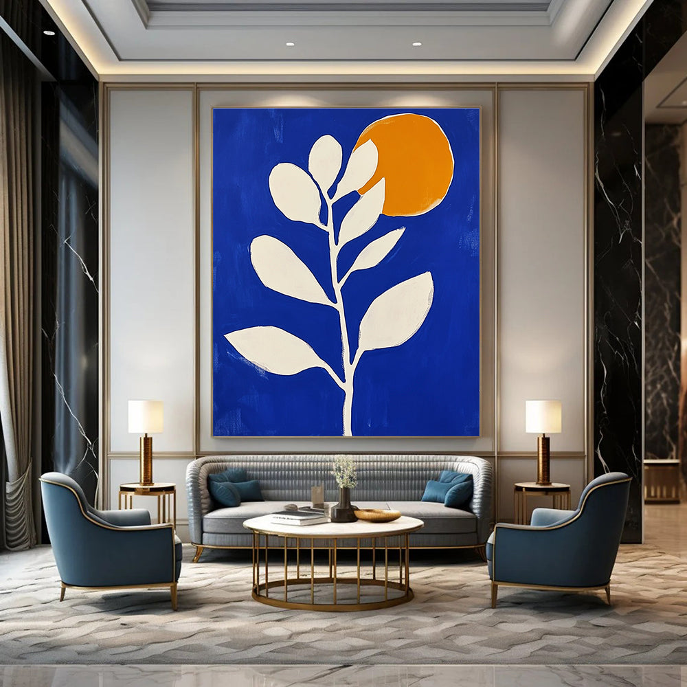 Large abstract painting in blue and white featuring minimalist flower shapes and an orange sun with bold brush strokes.STSC920