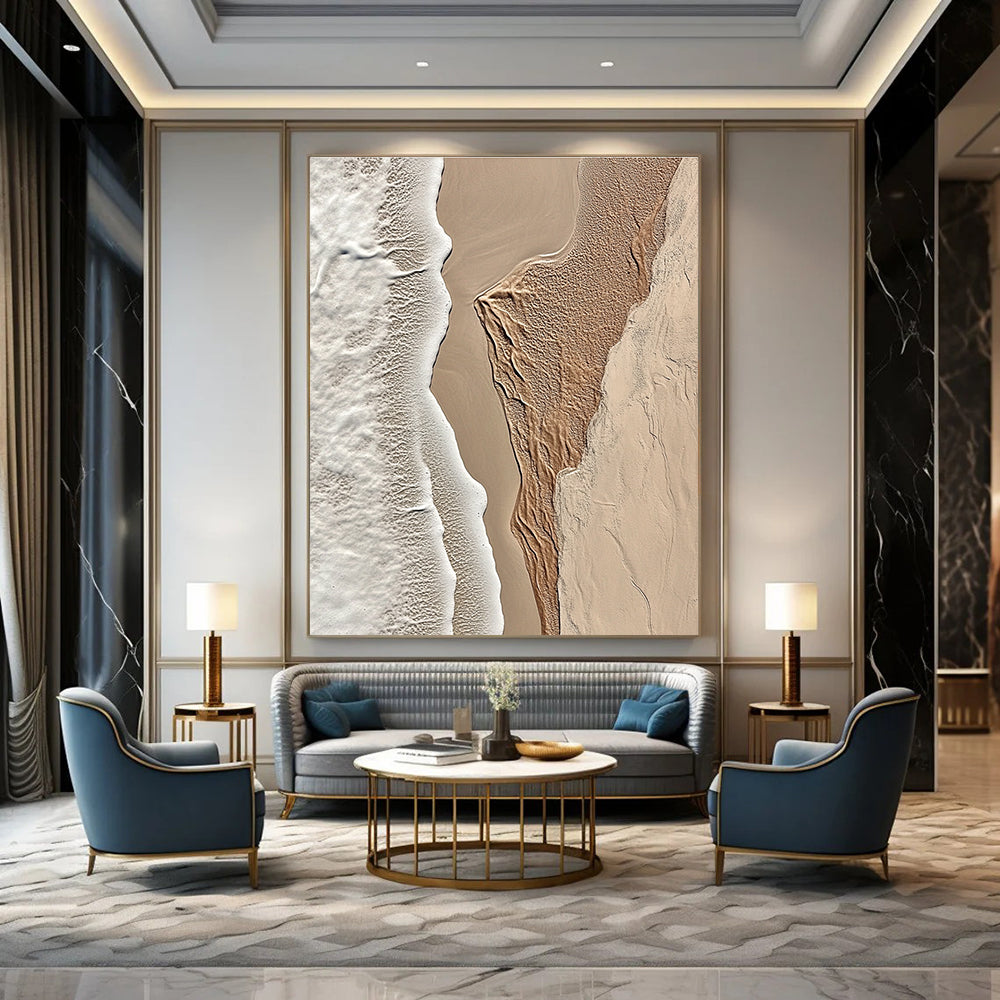 A large abstract painting featuring intricate textures of beige sand and white waves capturing the tranquility of coastal landscapes.STSC1294