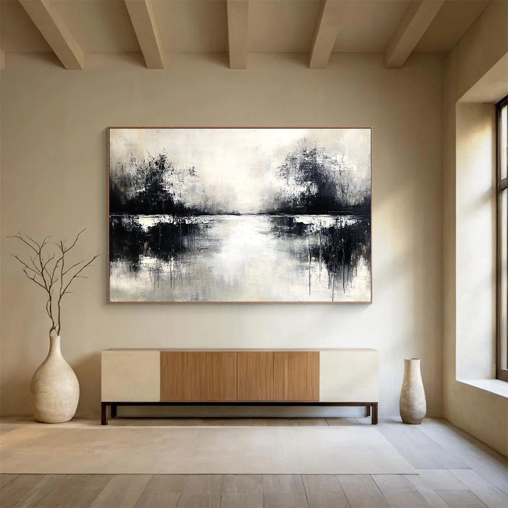 An abstract painting in black and white with neutral tones soft edges on canvas featuring atmospheric elements and a serene water reflection.SC056