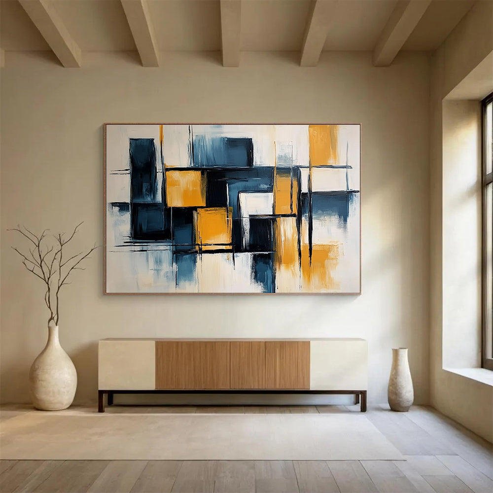Large abstract painting with light blue and dark yellow color blocks, elegant black lines, geometric shapes, and a touch of orange on a white background.SC591
