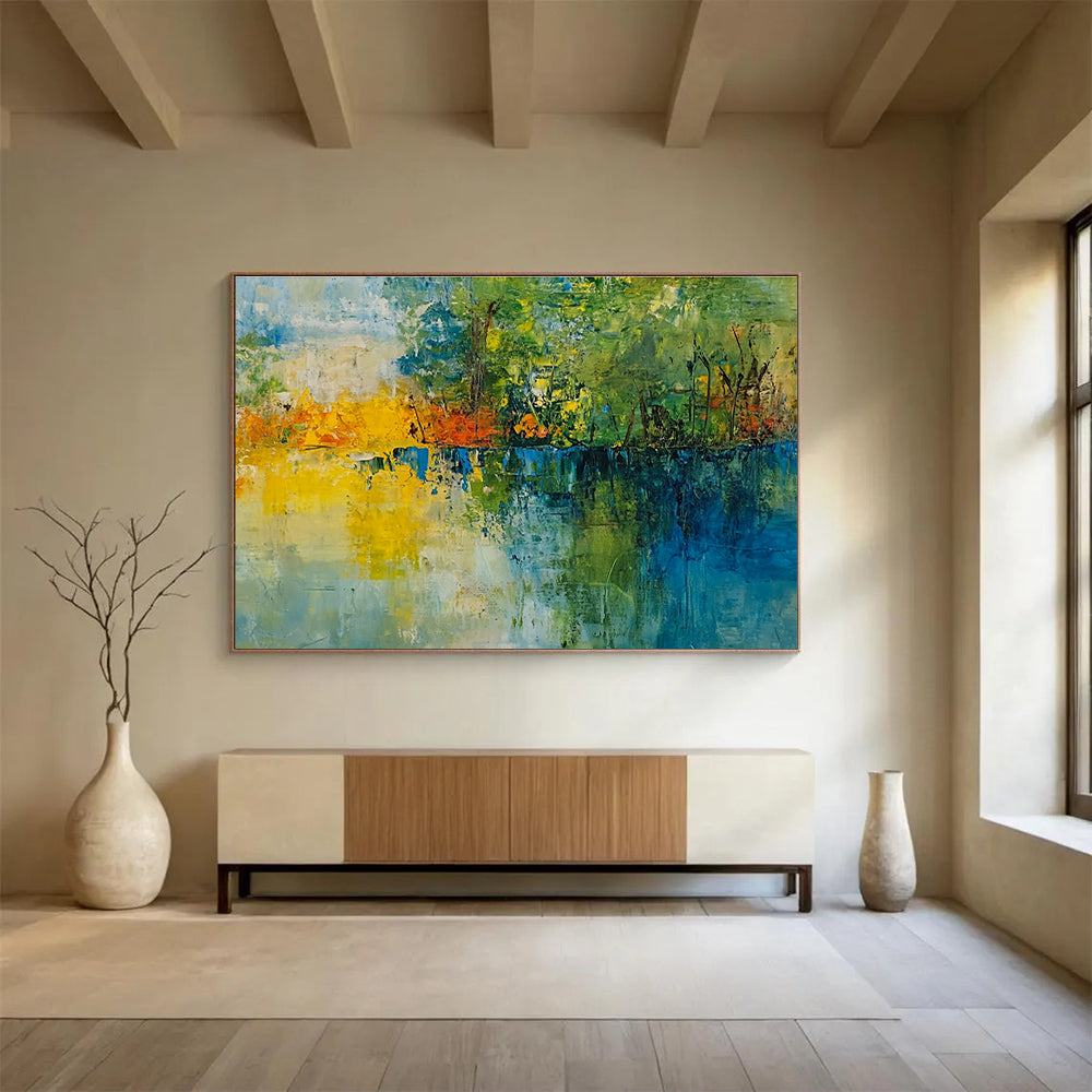 A large abstract painting featuring a vibrant landscape with trees a lake and a colorful sky perfect for home decor.SC519