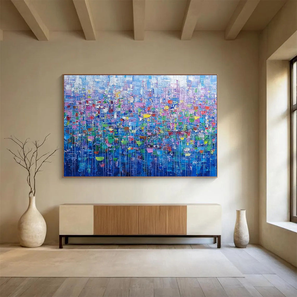 Large abstract painting of an urban landscape created with colorful squares and lines resembling small flowers in vibrant shades.SC474