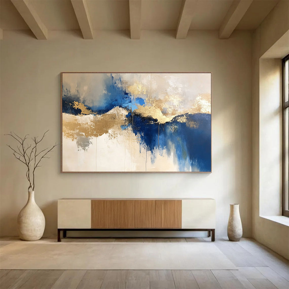 Large abstract blue and gold painting on a white background with elegant beige tones, ideal for modern decor and artistic spaces.SC022