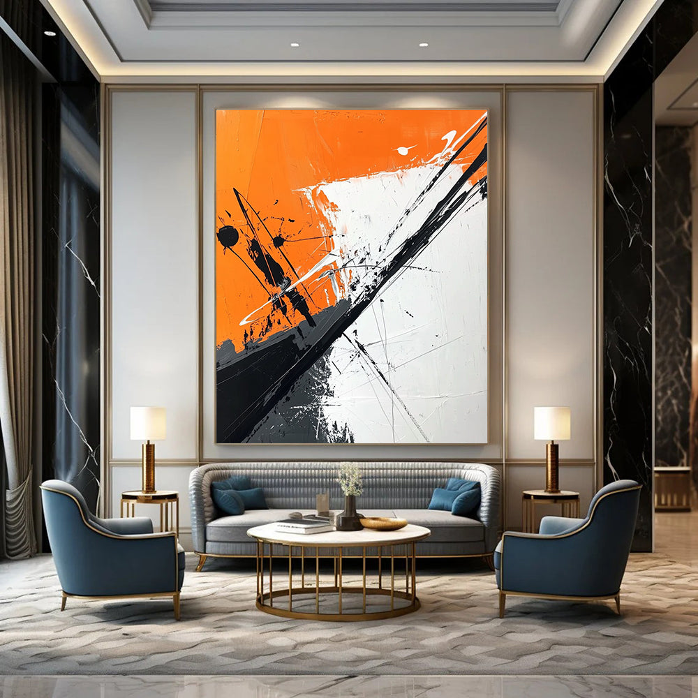 Large abstract painting features orange and white background with black brush strokes and dark gray diagonal line adding depth and artistic flair.STSC1118