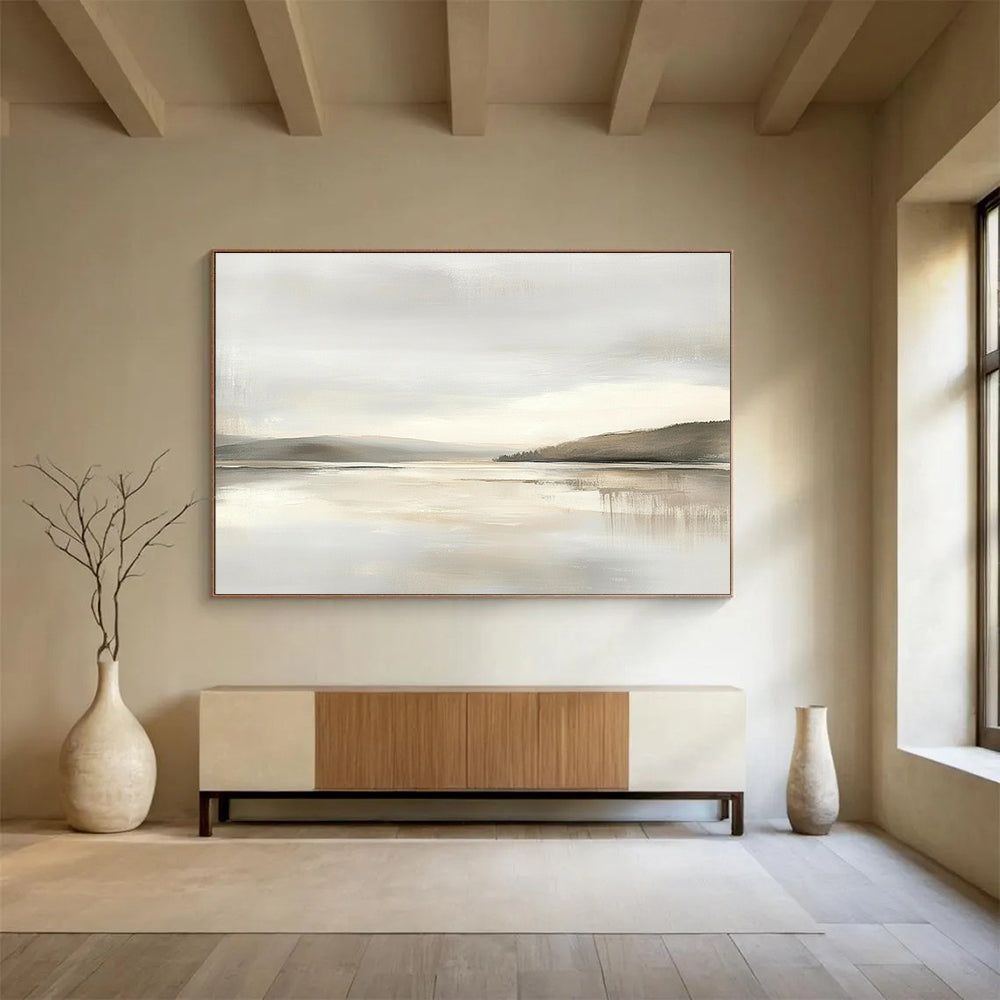 Large abstract painting featuring muted beige and gray tones with a soft sky and calm water for a tranquil and elegant atmosphere.SC065