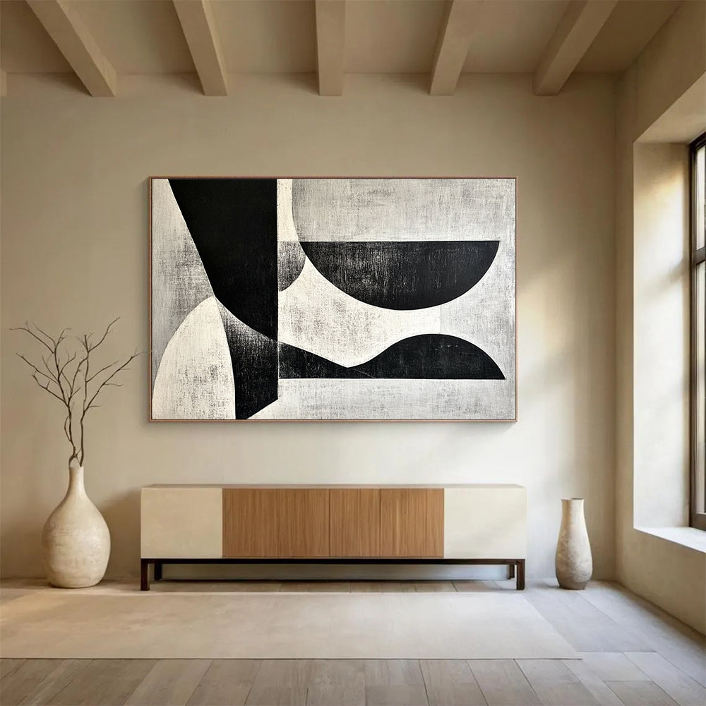A large abstract painting featuring black and white shapes on a gray background inspired by Wim de Vries artistic style.SC506