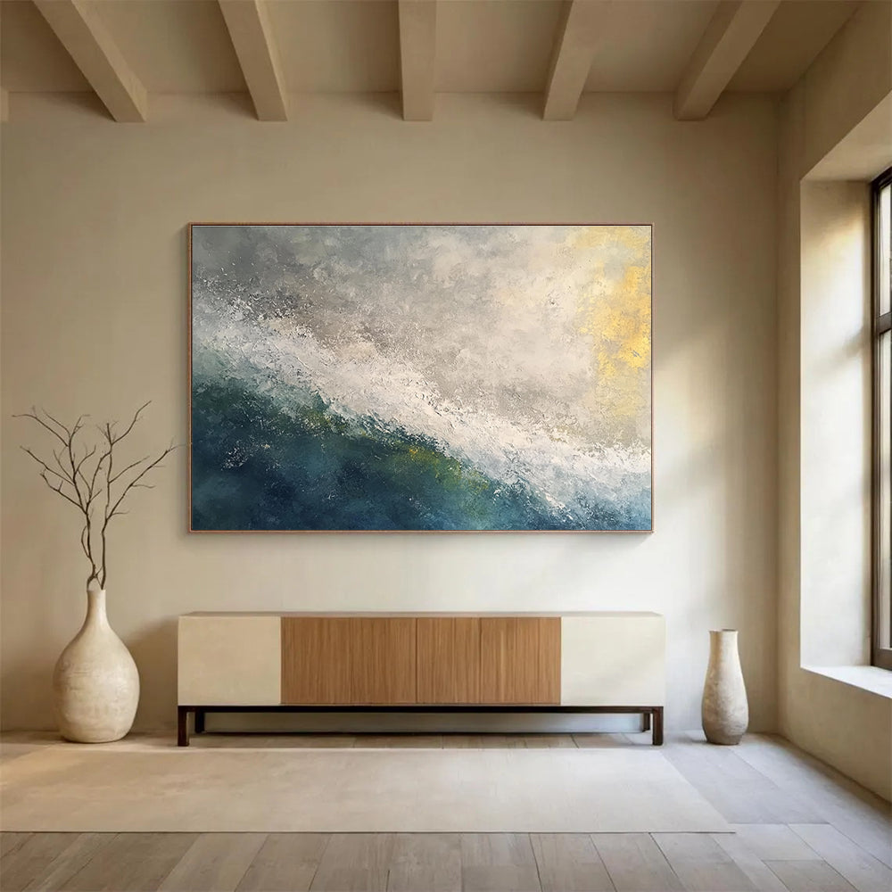 Large abstract oil painting of a stormy ocean at dawn featuring white and grey tones with touches of blue green and yellow.SC119