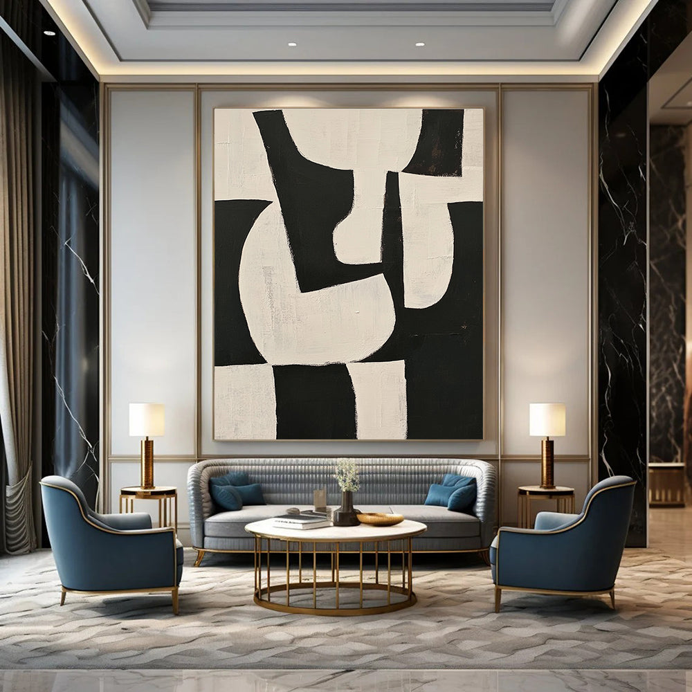 Large abstract painting featuring black and white shapes on a beige background with organic forms and overlapping lines for depth and elegance.STSC329