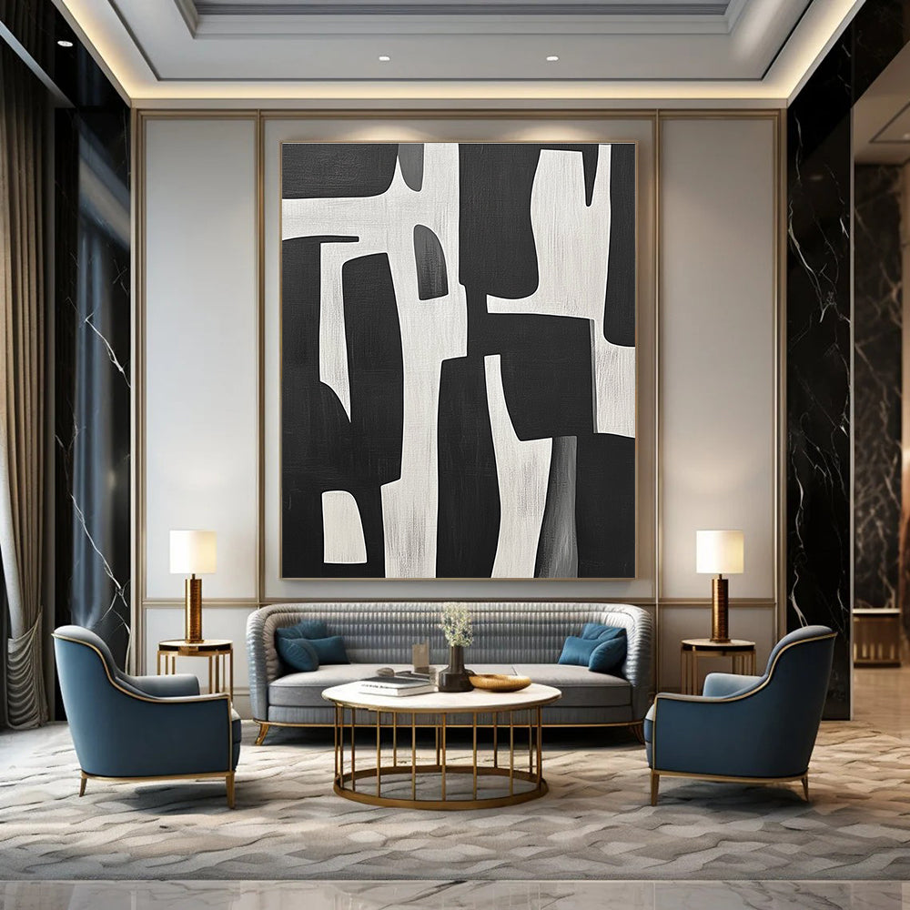 Large abstract painting of black and white shapes inspired by Jean-Paul Gaultier's style showcasing bold contrasts and dynamic forms.STSC328