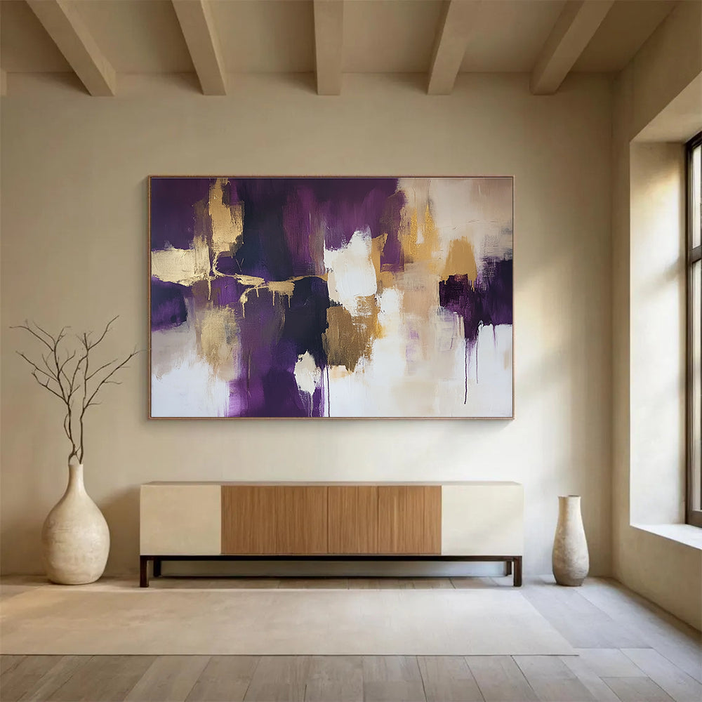 Large abstract painting with gold leaf highlights in shades of purple and beige accented by soft white edges creating a stunning composition.SC237