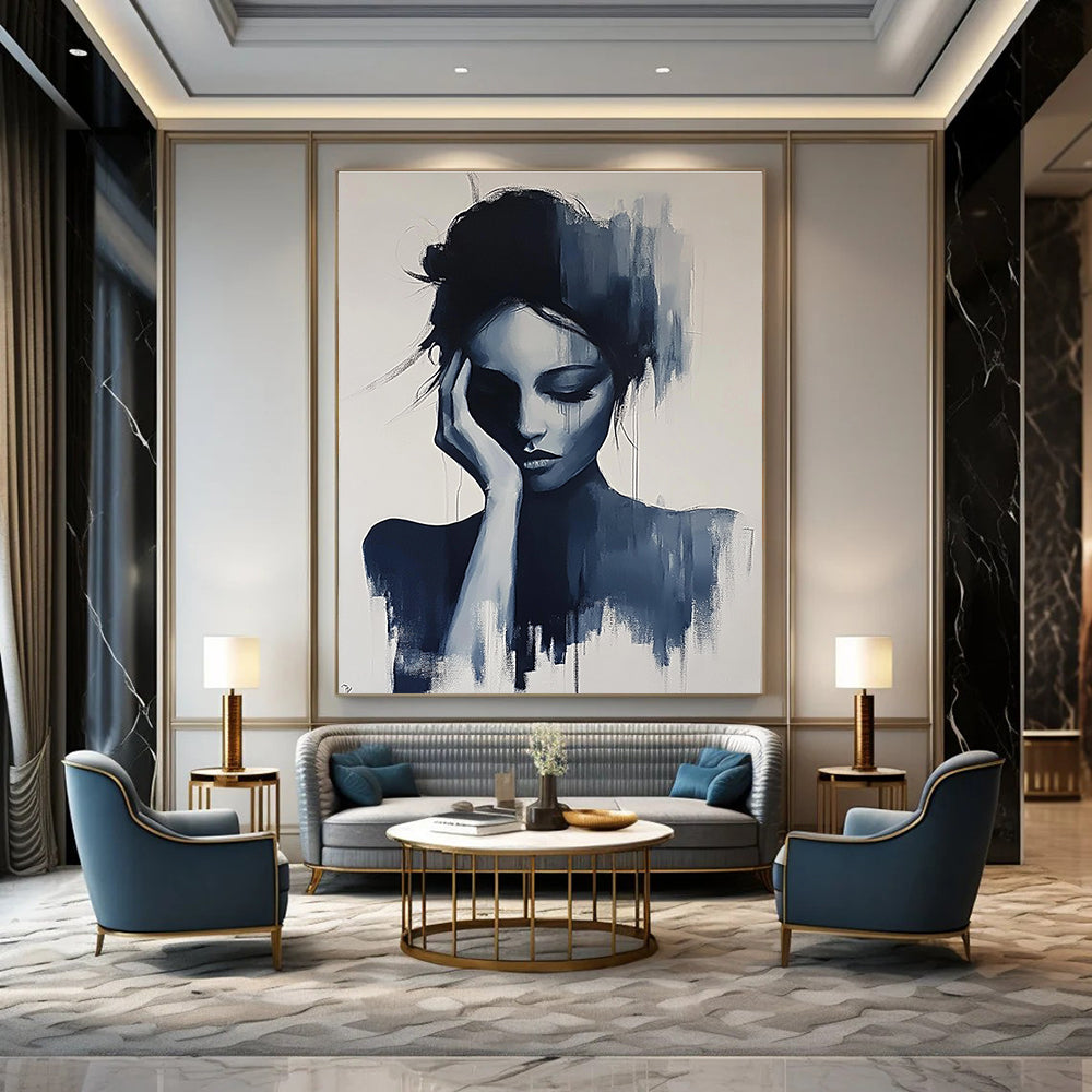 Large abstract painting of a gray woman with her hand on her face and hair up in black and white colors.STSC1378